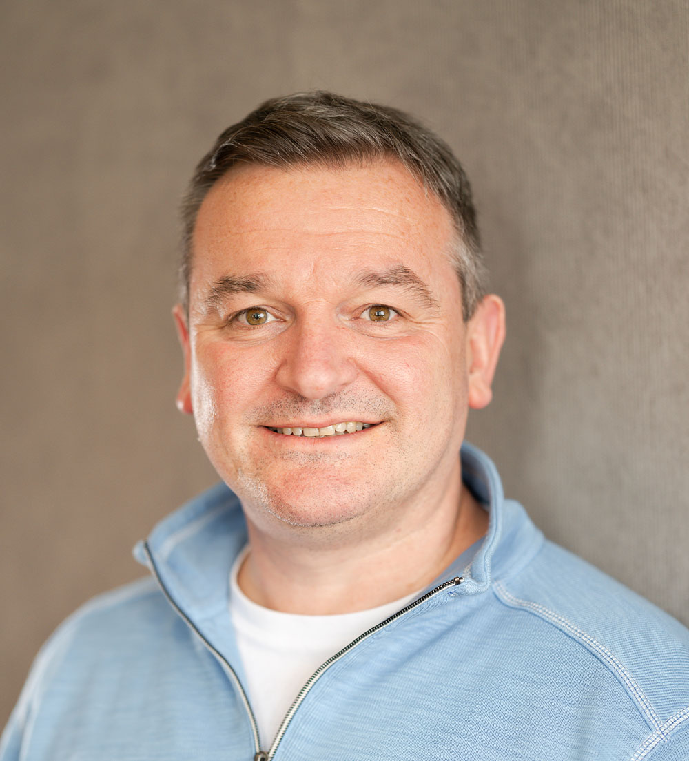 Headshot of Tony Marron, Managing Director, Liberty IT and Global Engineering Capability Lead, Liberty Mutual