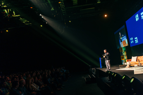 Tony standing on stage