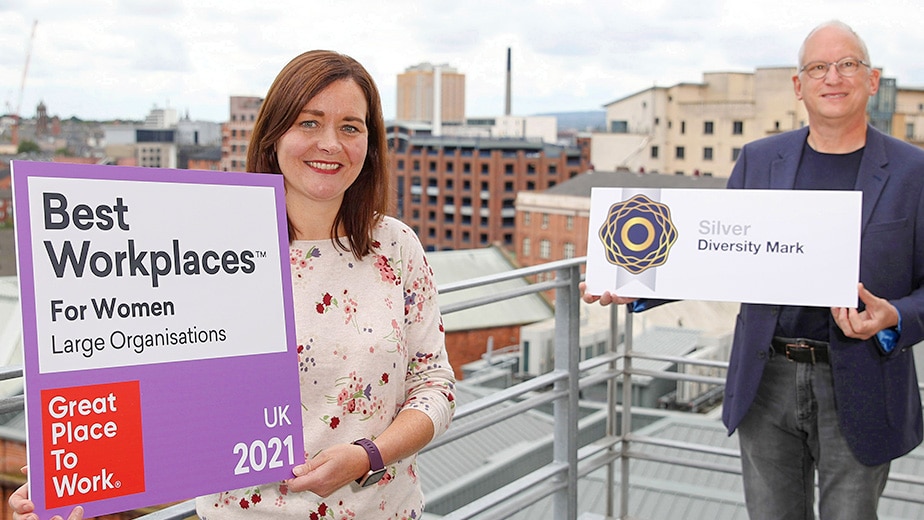 Cathy Donnelly and William Hamilton with images of Best Workplaces and Silve Diversity Mark logos