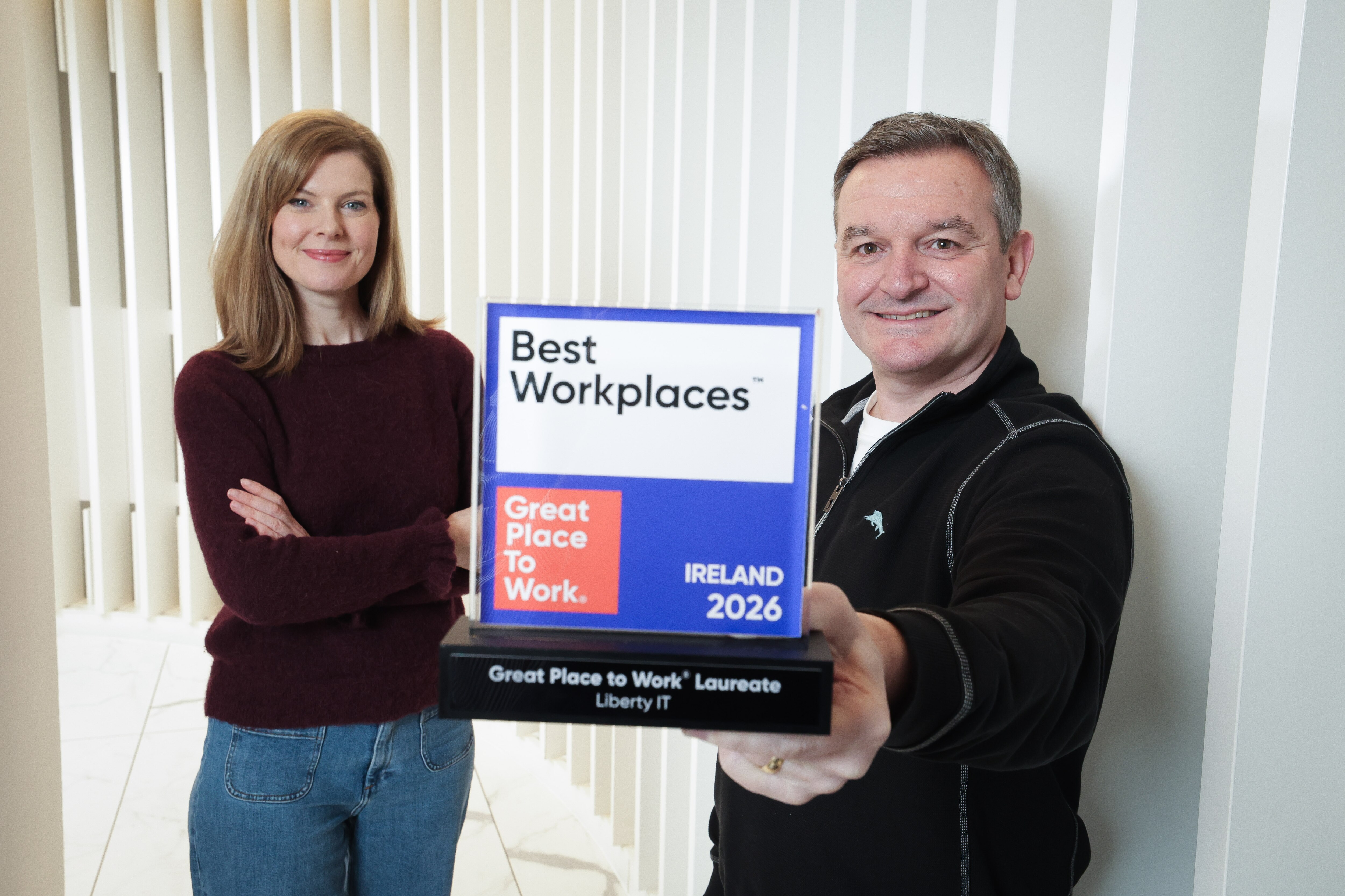 Picture of Tony and Emma with GPTW award