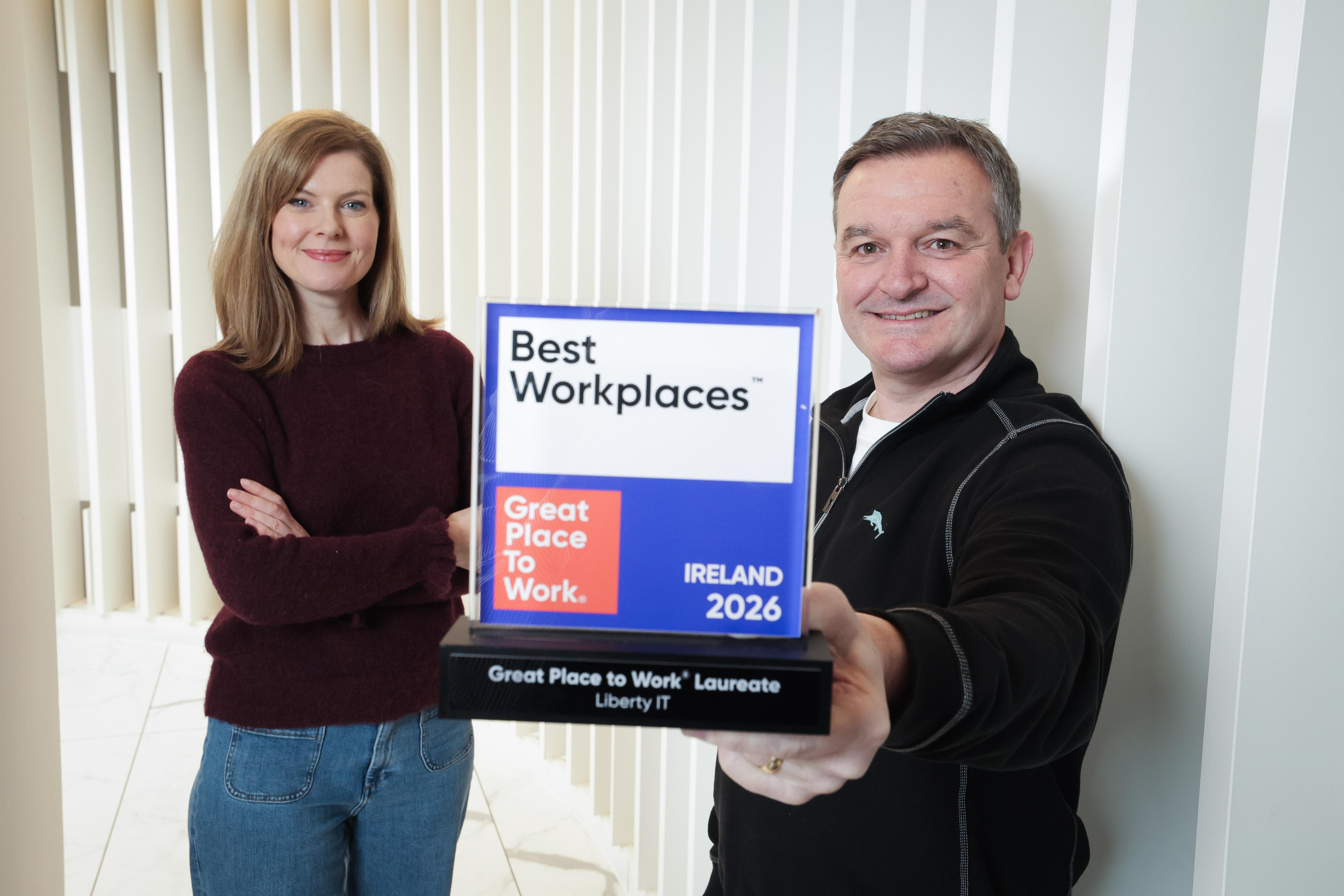 Picture of Tony and Emma with GPTW award